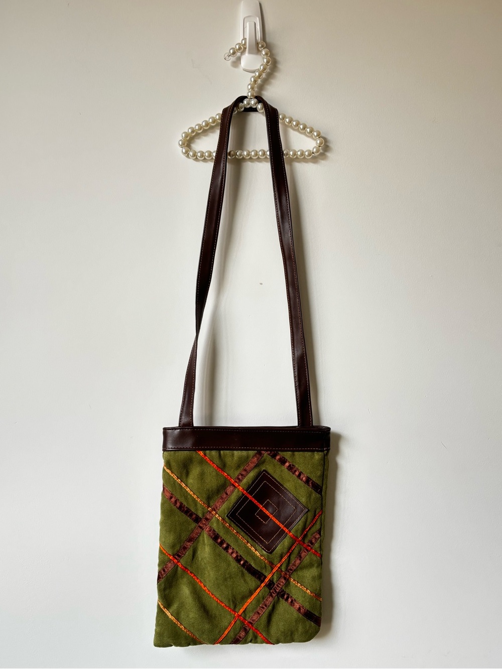 geometric green suede over the shoulder bag
